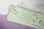 Lade das Bild in den Galerie-Viewer, Supersoft Premium Jersey "Weinbeeren" Grid Grün helldunkel 0,5 m
